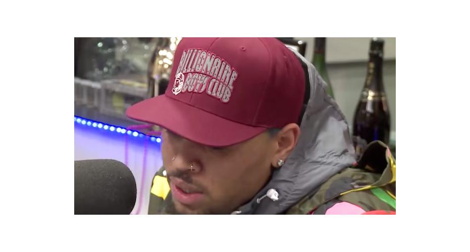 Chris Brown wearing BBC X Mitchell & Ness Burgundy/Silver Arch Snapback