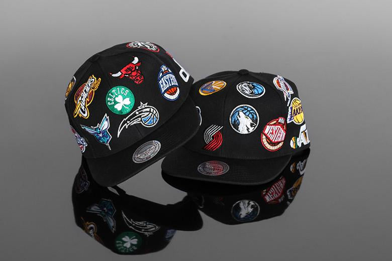 Mitchell & Ness East/West All Over Snapbacks